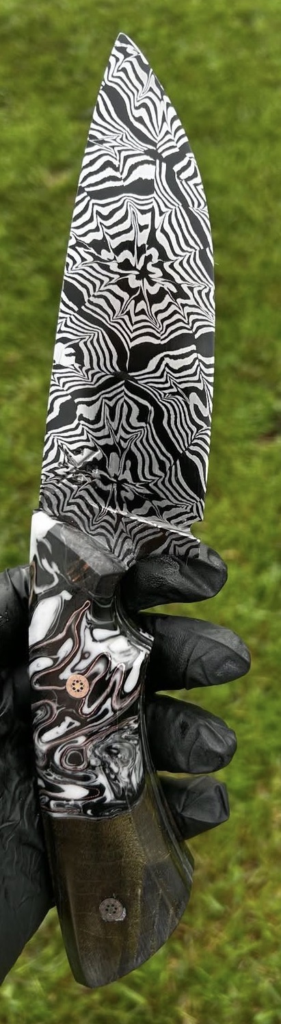 Patterned blade with custom black and white handle