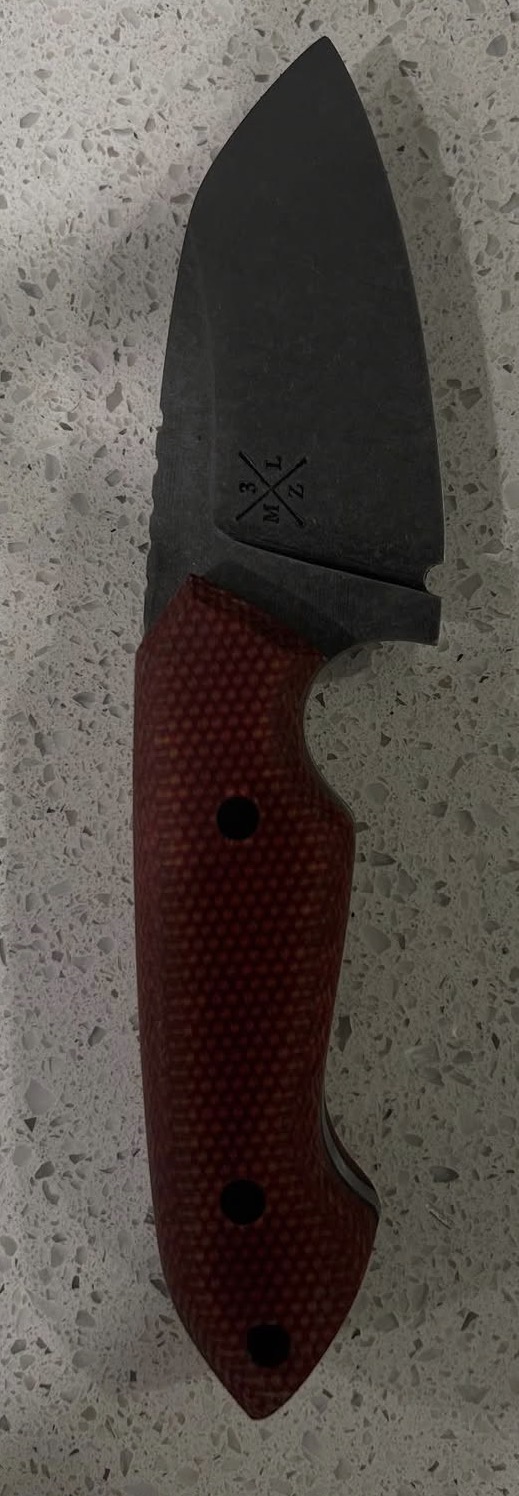 Knife with red textured handle