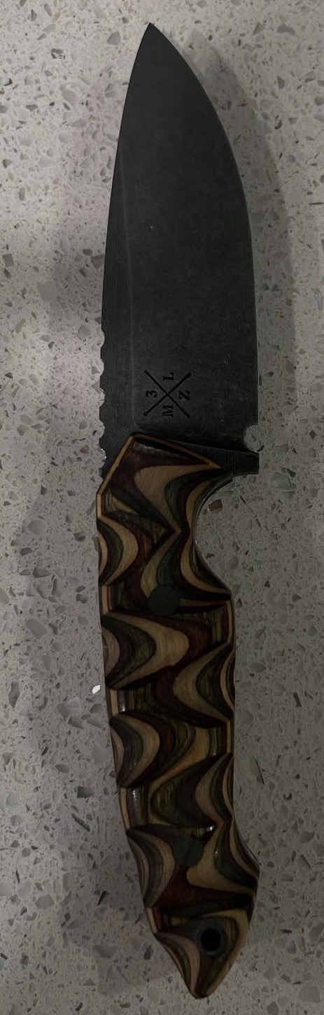 Dark finished blade with layered wood handle