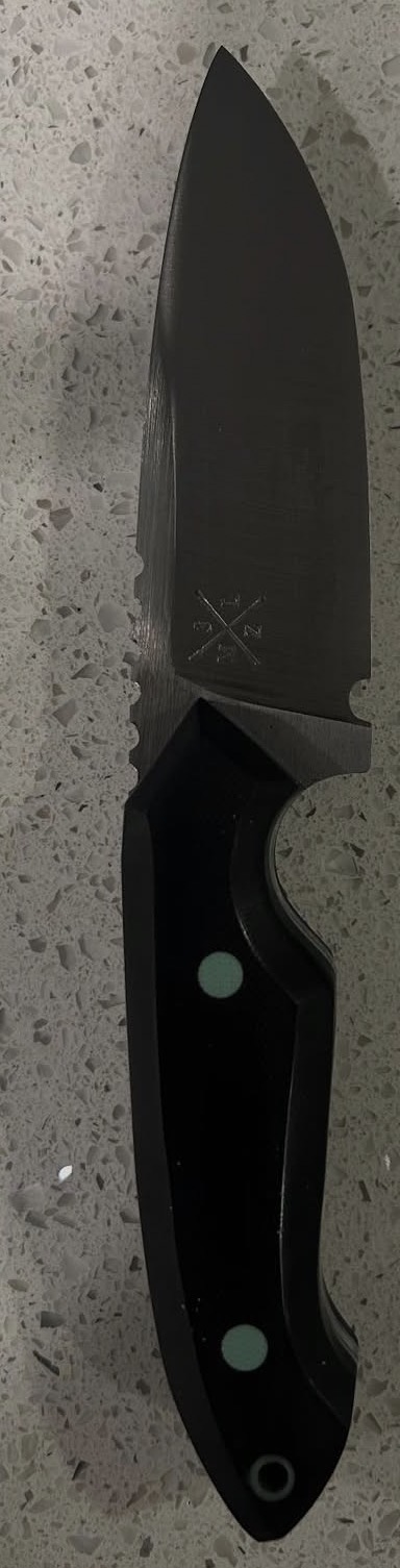 Black finished knife with turquoise details